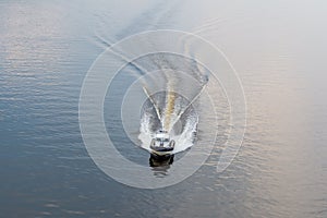 Police boat on the river in the evening