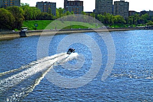 Police boat on the river in spring