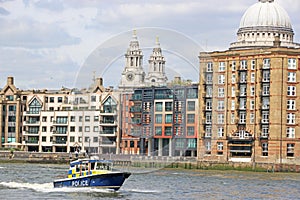 Police boat on the River Thames, London