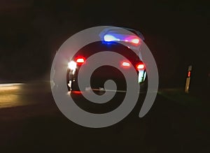 Police car, cop pursuit in night blue red light