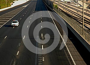 Police car on empty road