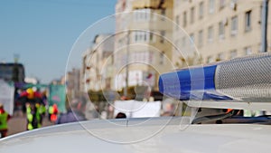 Police Car Light Lamp Blinking signal standing city street. Close up footage