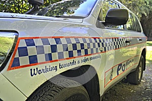 Police car in Queensland Australia with focus on the message