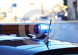 police car siren with flashing lights during the road block to chase the criminals