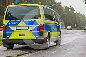 Police car from the state of Brandenburg from behind on the highway