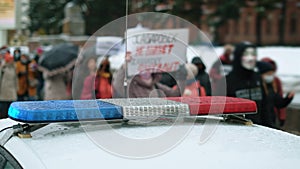 Police car strobe flashers. Red blue light bar on officer vehicle. Public strike