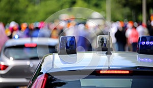 Police cars flashing sirens in the city