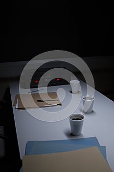 Police Custody Interview Room with Coffee Cups