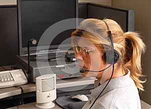 Police dispatcher at console