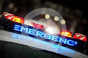 Police emergency lights with warning text