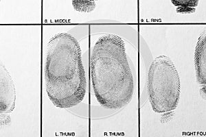 Police form with fingerprints, top view