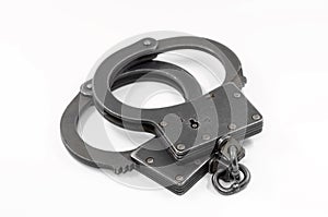 Police handcuffs on a white background