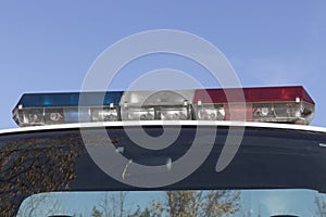 Police light bar, roof mounted red and blue lights. For use in traffic stops and emergencies.