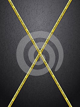 Police line tape on asphalt background