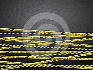 Police line tape on asphalt background