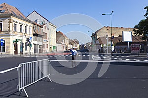 Policeman restricting the traffic on a street