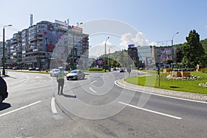 Policeman restricting the traffic on a street