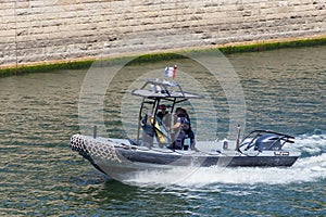 PARIS, FRANCE - JUNE 23, 2017: Police motor boat on the Seine river in the center of Paris