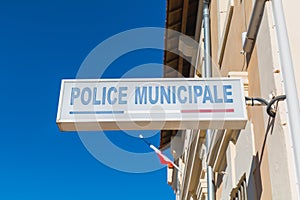 Police Municipale municipal police sign on the storefront of a local police station