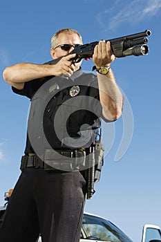 Police Officer Aiming Weapon