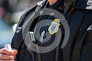 Police officer with badge and uniform