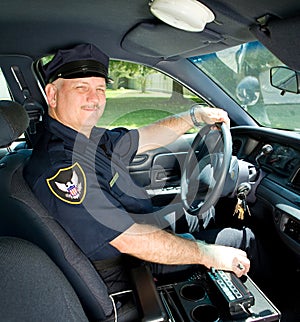 Police Officer Drives Squad Car