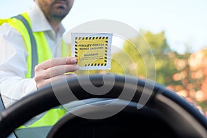 Police officer giving a fine for parking violation