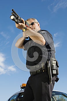 Police Officer With Gun