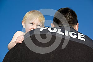 Police Officer Holds Baby