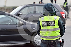 Police officer managing road traffic