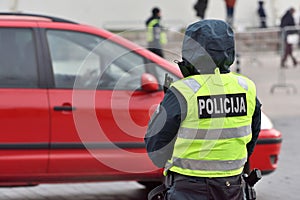 Police officer managing road traffic