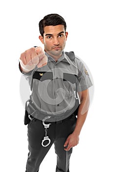 Police officer or prison guard pointing his finger