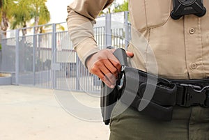 Police officer protecting high school campus photo