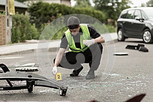 Police officer securing accident scene