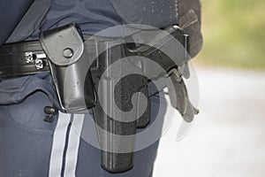 police officer with service weapon