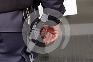 police officer with service weapon