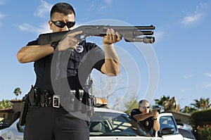 Police Officer With Shotgun