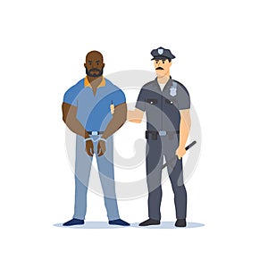 Police officer in uniform holding male criminal in handcuffs