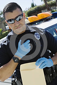 Police Officer Using Two-Way Radio