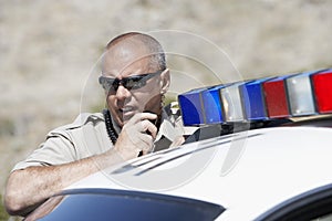 Police Officer Using Two Way Radio