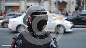 Police officers in protective body gear with armor and helmets enforce law.