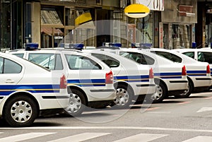 Police patrol automobiles on streets