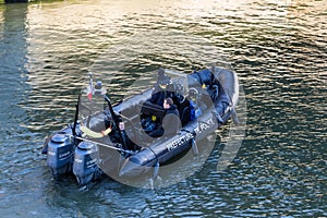 The police patrol boat on the Seine river.