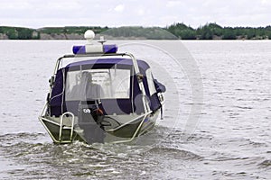Police patrol boat on water area on