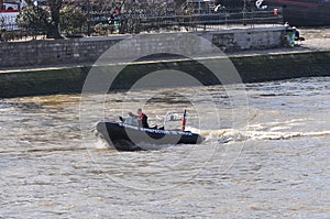 Police powerboat on the river Seine in Paris