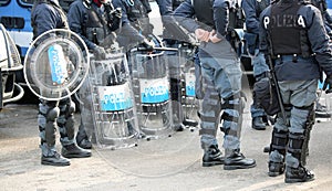 police with shields and riot gear during the event in the city