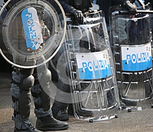 Police with shields and riot gear during the sporting event