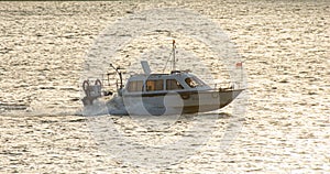 Police speedboat on a sunny river