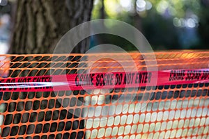 Police tape with `Crime scene do not enter`