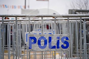 Police text in Turkish on the police barricade